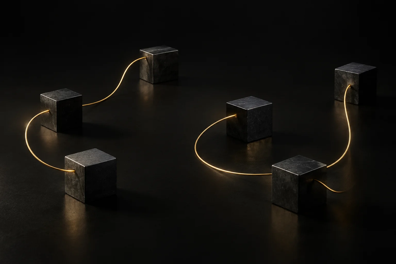 A gold thread connecting matte black cubes